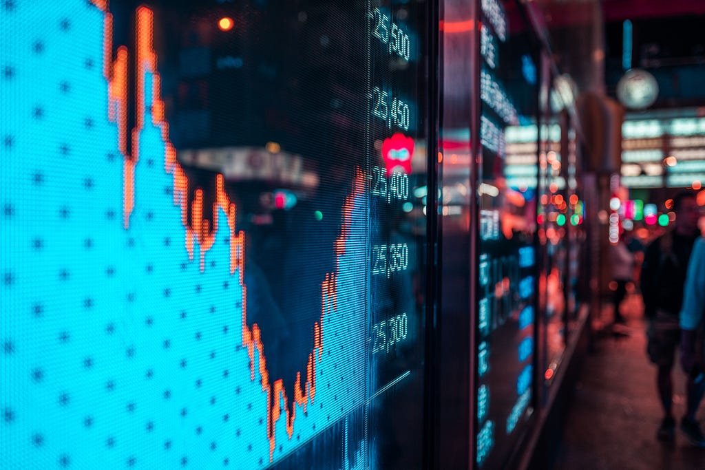 Financial stock exchange market display screen board on the street, selective focus