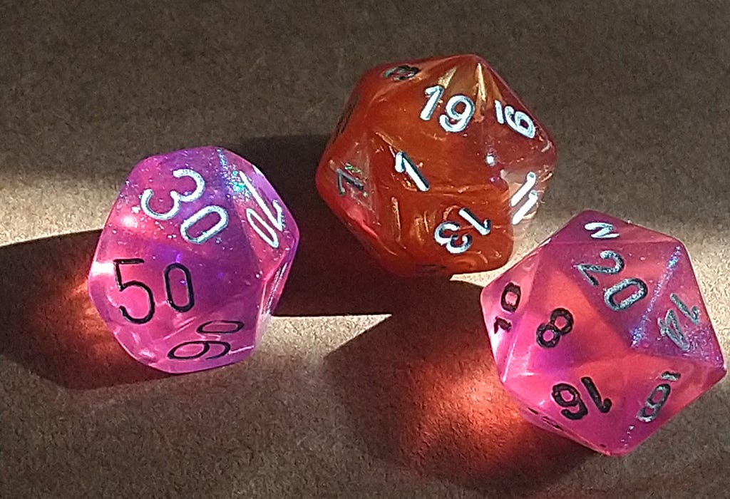 3 polyhedral gaming dice for playing Dungeons and Dragons