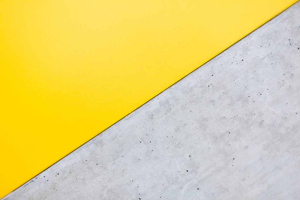 A yellow and gray wall.