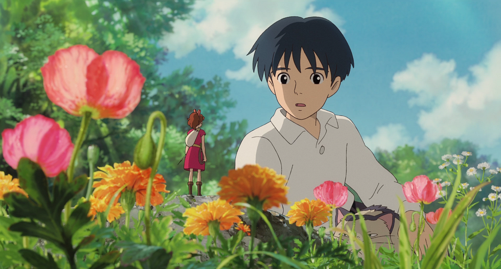 a small girl and a normal boy talk to each other in the flowers