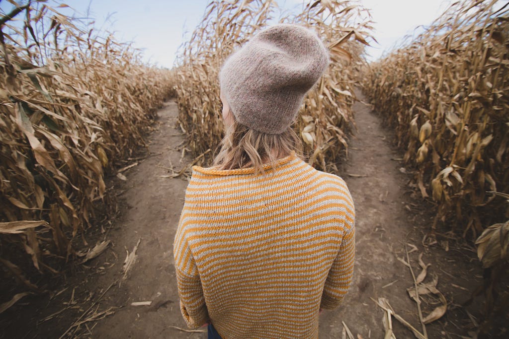 Woman in cornfield path
