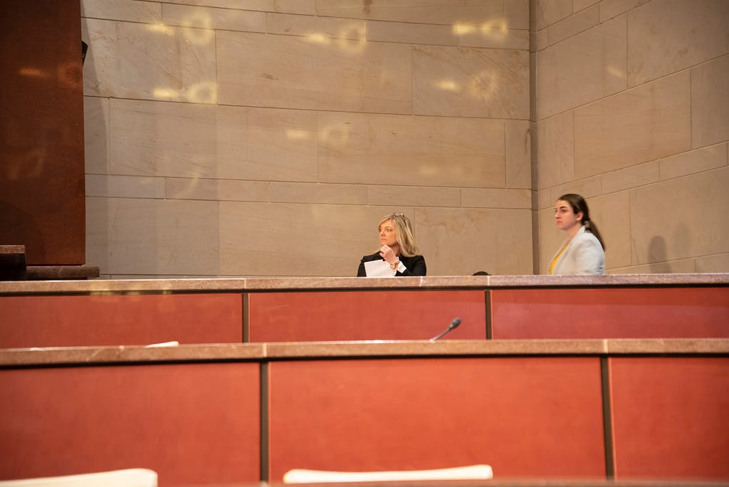 Terri Tanielian waits for a congressional hearing to begin. Photo by Grace Evans/RAND Corporation