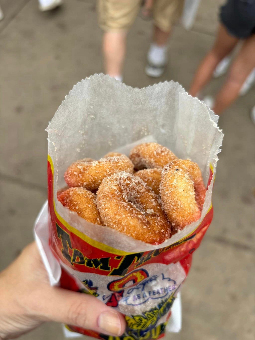 A bag full of fresh mini-donuts at the Minnesota State Fair.