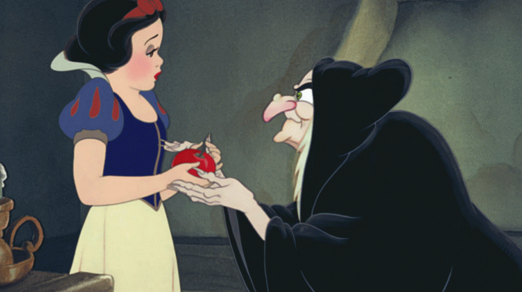 Snow White being handed a poisoned apple by the evil queen, who is currently disguised as an old woman.