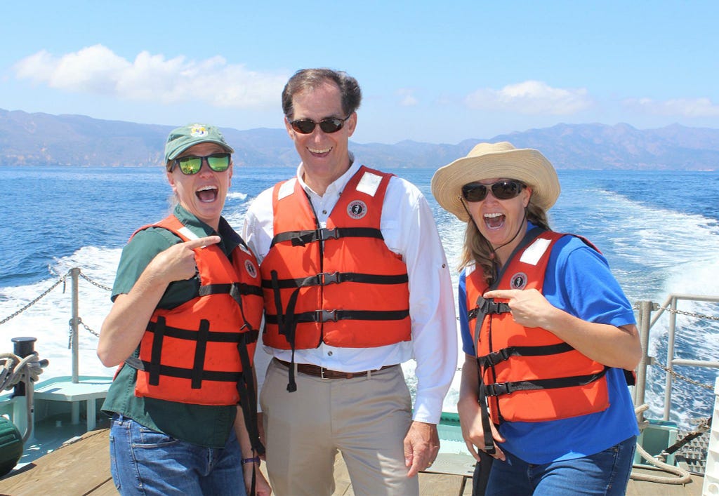 Boat trip to Santa Cruz Island with then-USFWS Director Dan AShe and colleague Angela Picco to celebrate the delisting of island foxes on the northern Channel Islands. Photo Credit: Robert McMorran