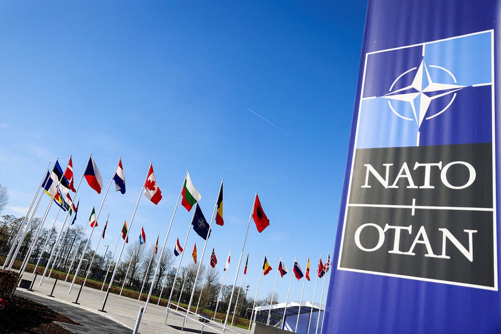 Flags flutter at NATO headquarters in Brussels, Belgium, April 4, 2023. Photo by Johanna Geron/Reuters