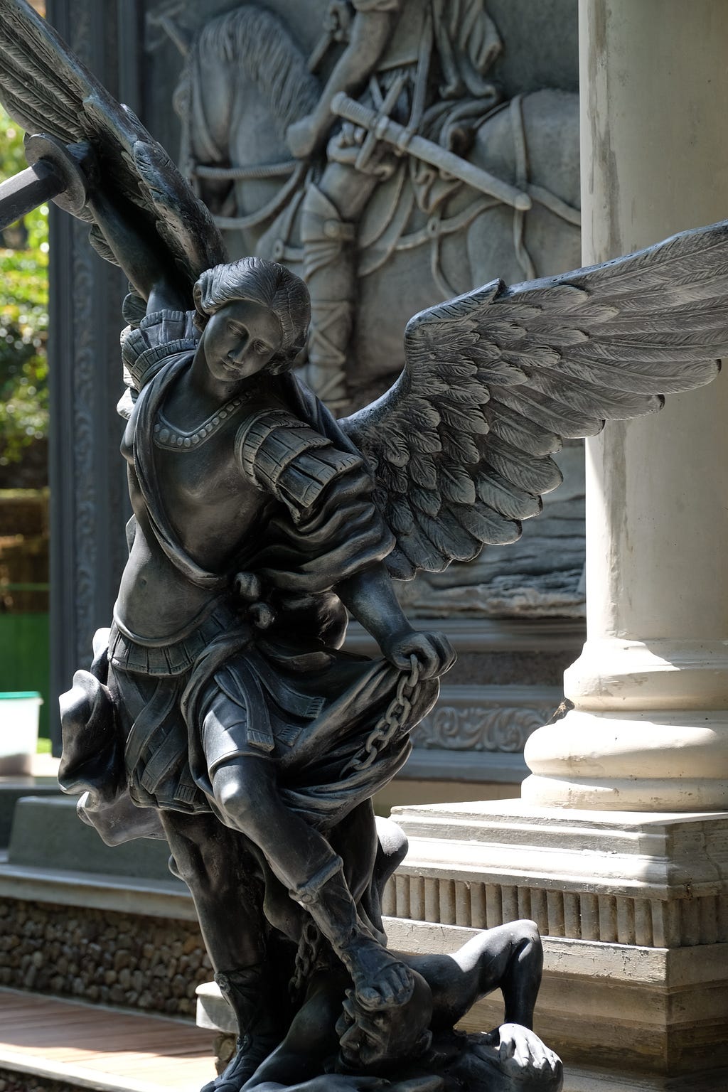 The Archangel Michael battling Satan