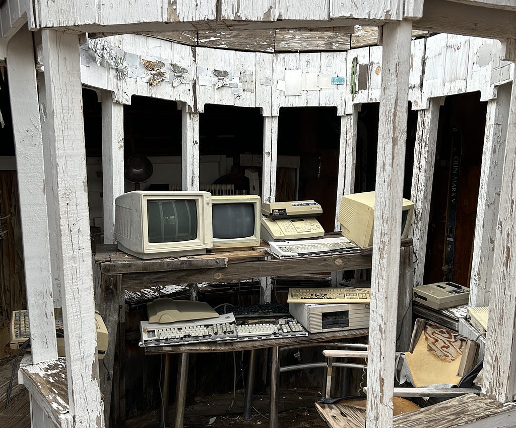 Old broken computers in ruins