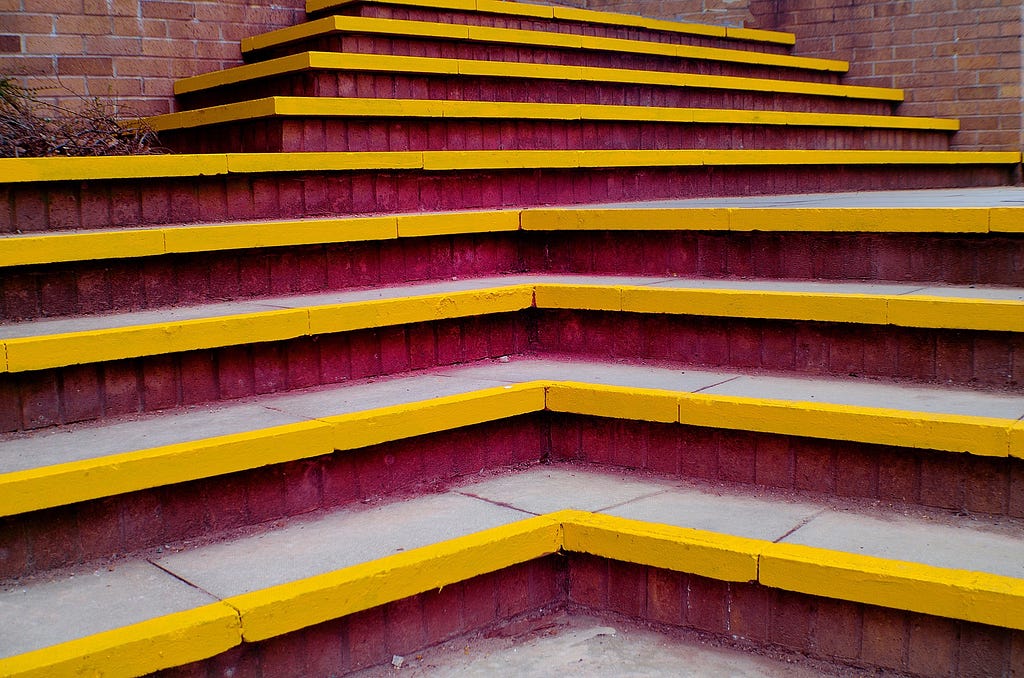 A pyramidal staircase, decreasing in width from bottom to top.