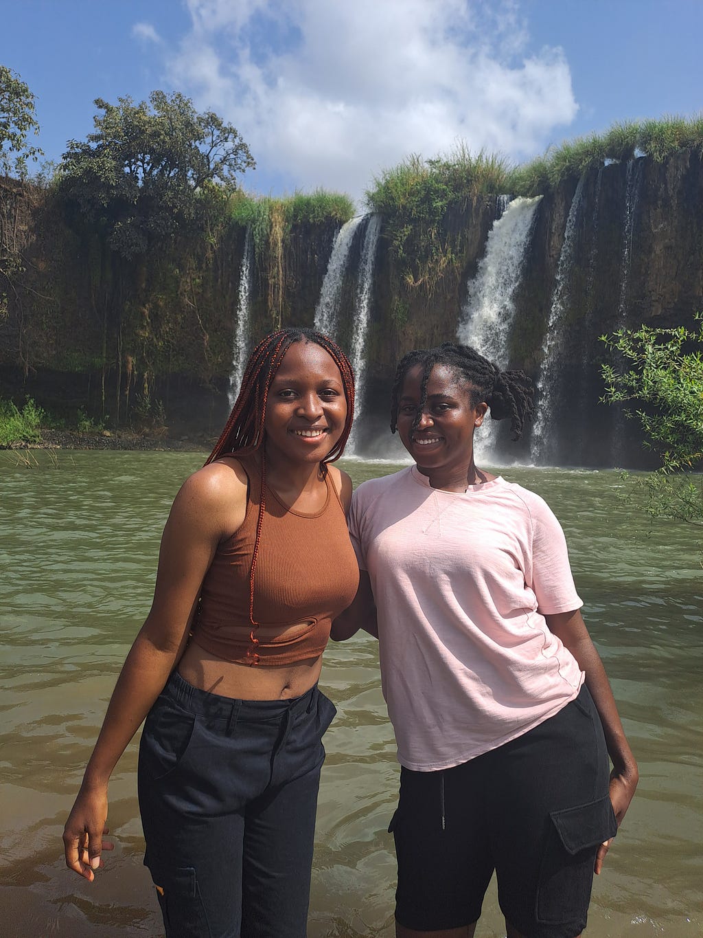 A picture with the friend of my heart, Nkechi at the Matsirga Waterfall in Kafanchan.