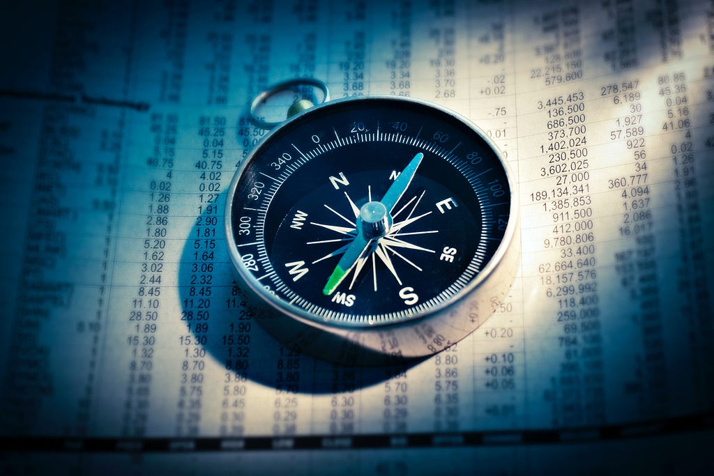 A navigation compass on a spreadsheet