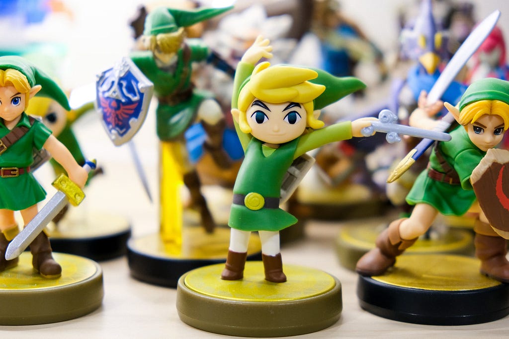 Various small figurines of the Legend of Zelda protagonist, Link.