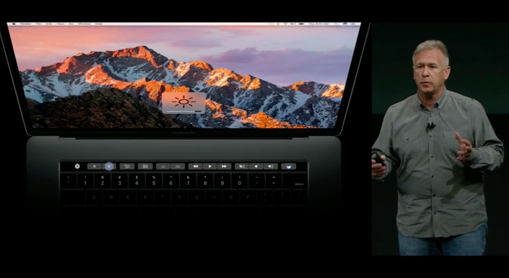Phil Schiller presenting the 15 inch MacBook Pro with touch bar at the 2016 keynote event.