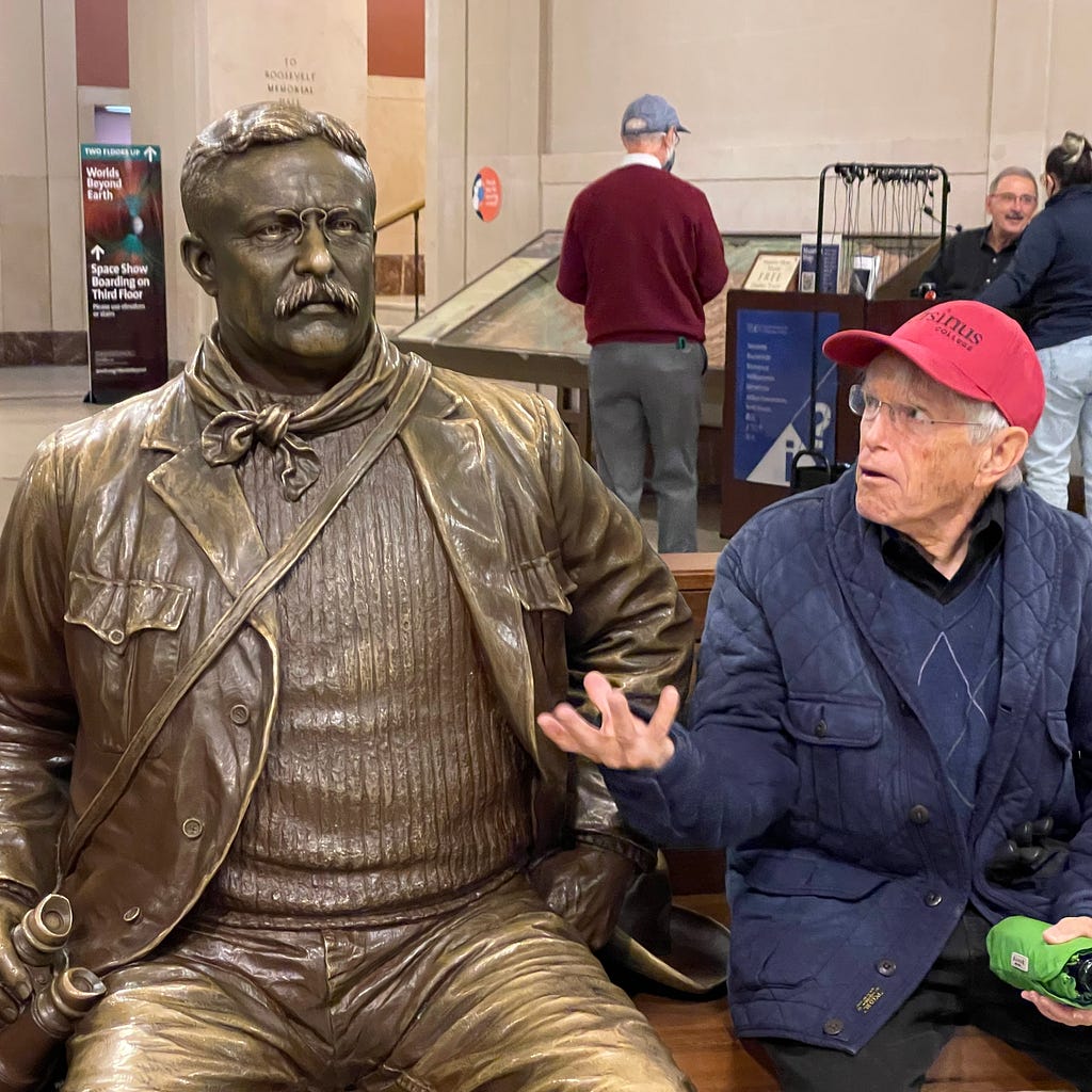 Robert Harlow “in conversation” with Teddy Roosevelt at the American Museum of Natural History.