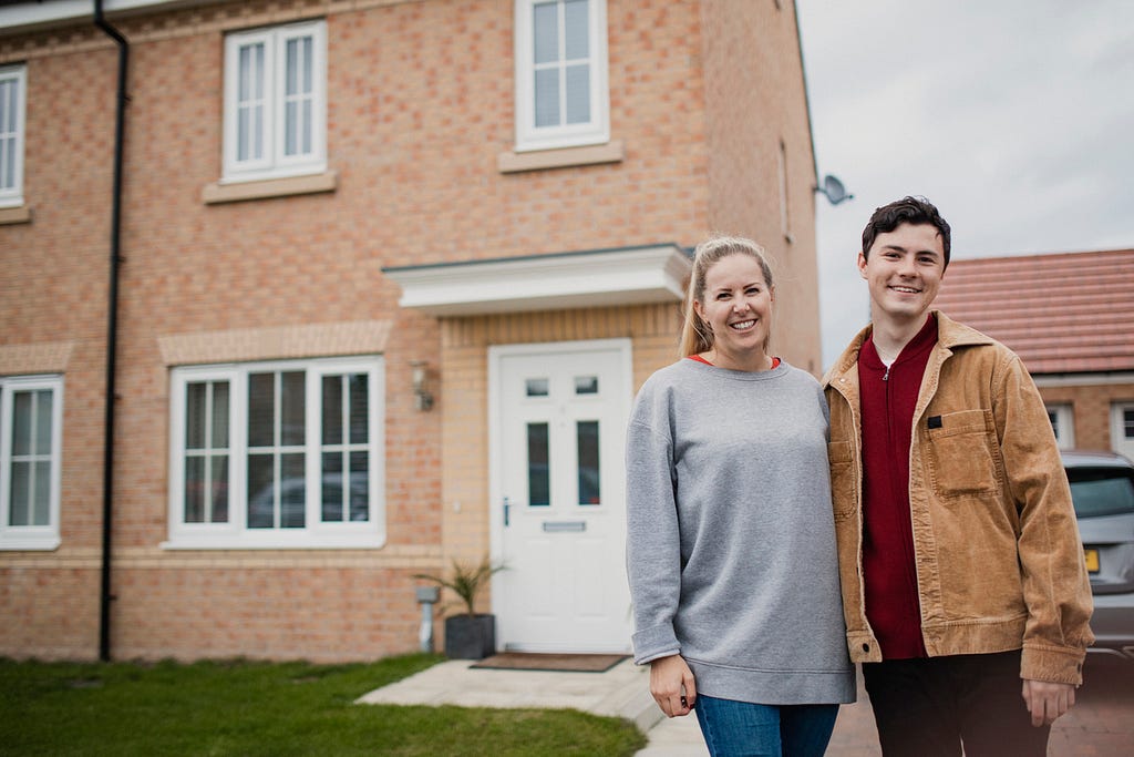 couple purchase first home