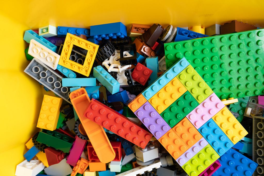 A photo of a box full of lego bricks
