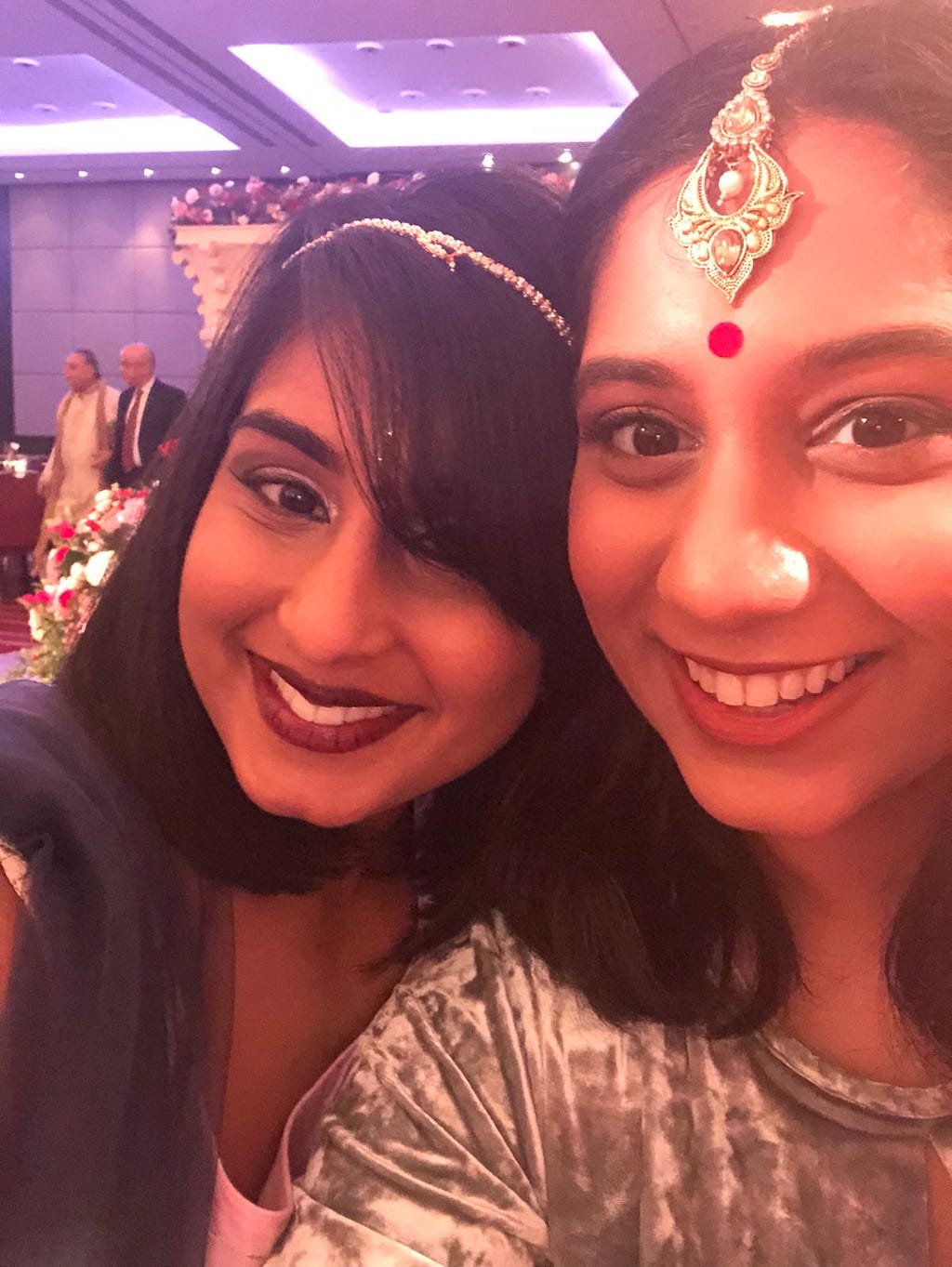 My cousin and I at our cousins wedding. I am the one with the fringe!