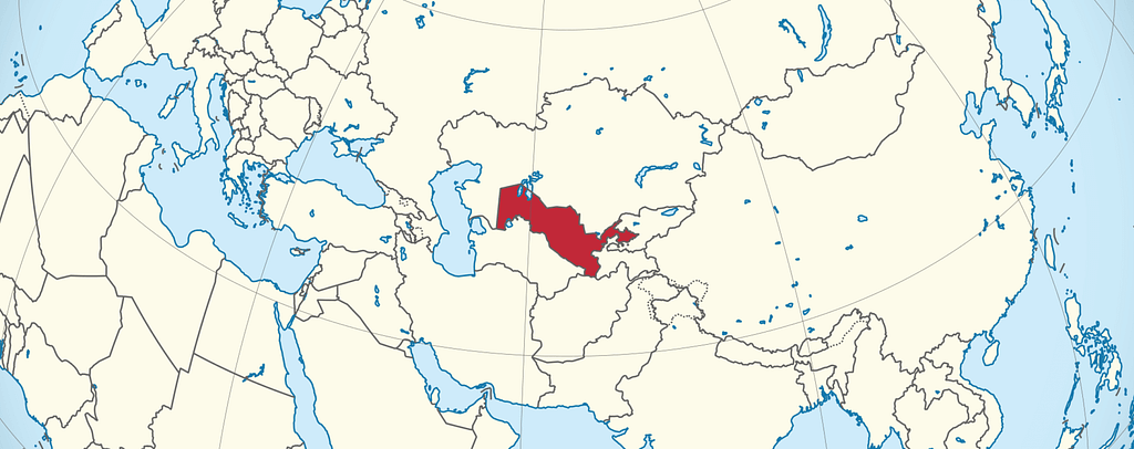Uzbekistan’s map shown on a zoomed world map and highlighted with red color