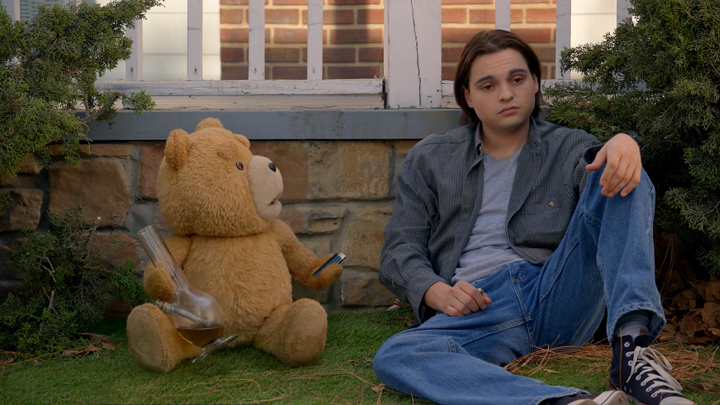 John and Ted having a smoke session outside their house and having an honest, open discussion in the last episode of the season, further displaying the act of smoking weed a normalcy for them. Credit: Peacock