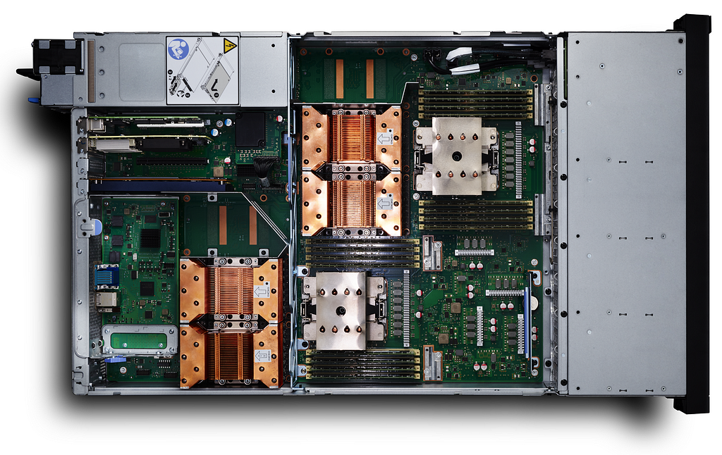 Internal view of a Power Systems AC922 server with four NVIDIA Tesla V100 GPUs installed.