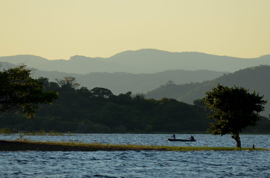People in a boat fishing on Lake Kariba