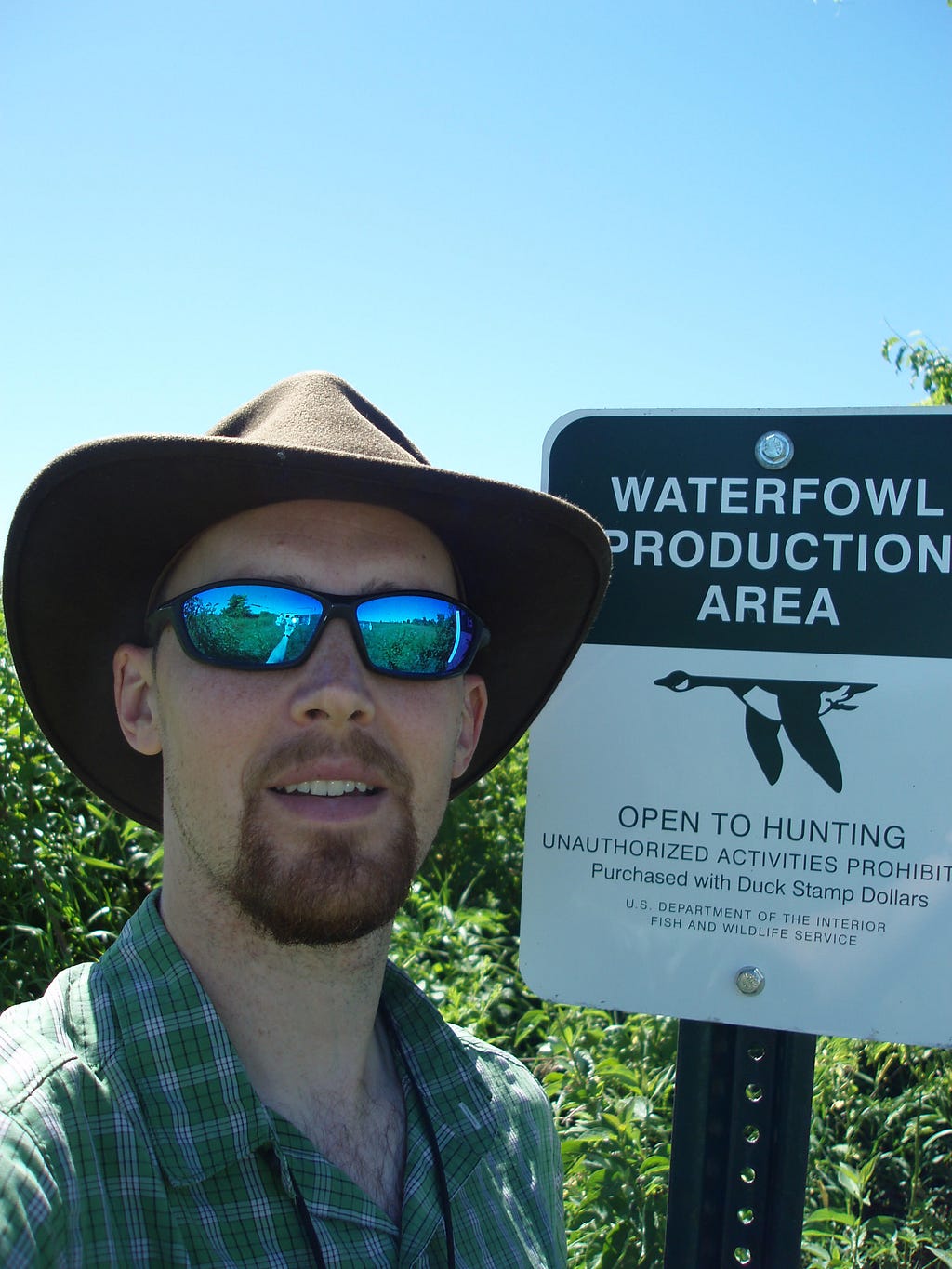 Ethan at a recently acquired Waterfowl Production area that is under restoration from row cropping to prairie