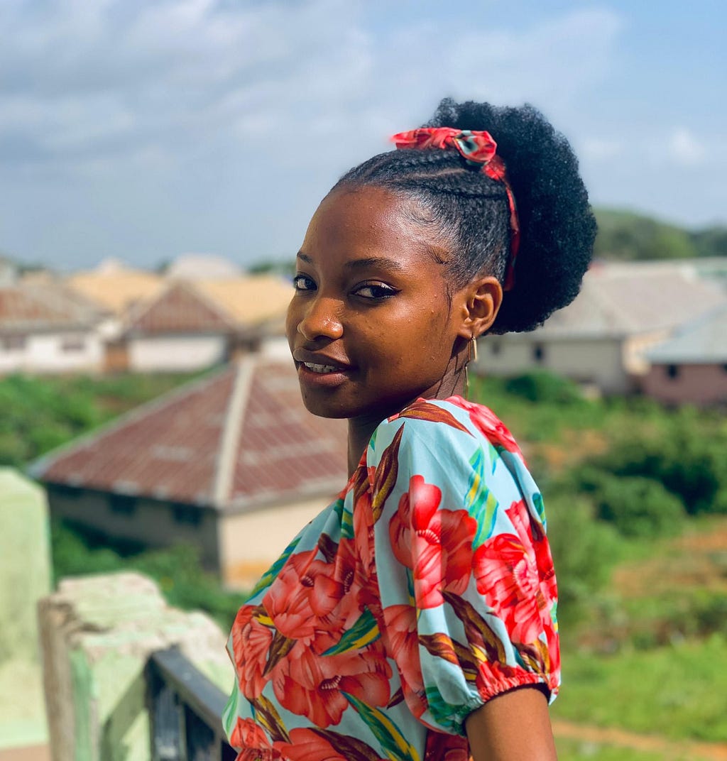 A fair beautiful girl wearing a flowery dress