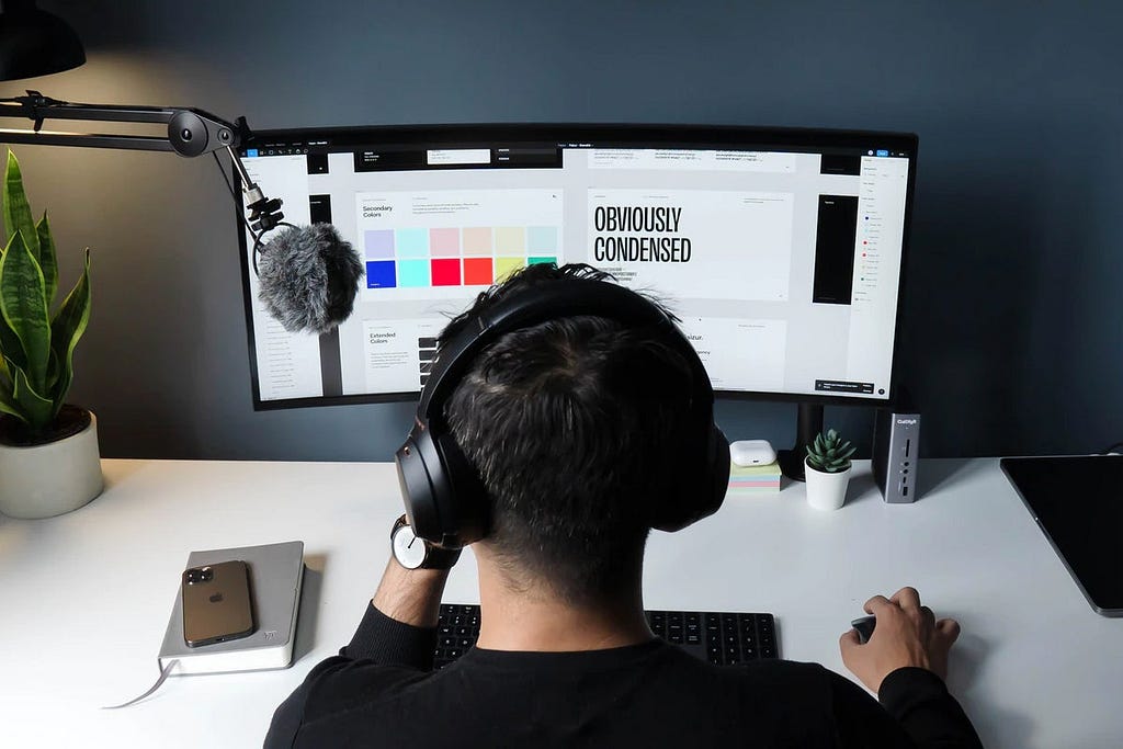 A student working doing product design work on the computer