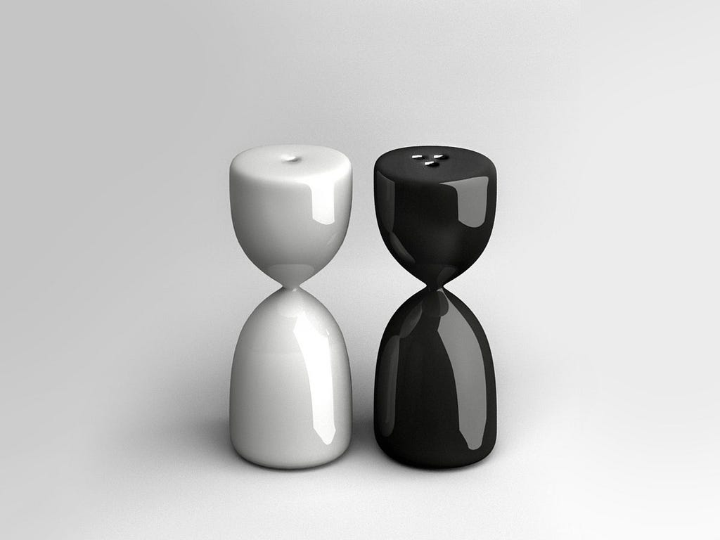 Salt and pepper shakers shaped like hourglasses