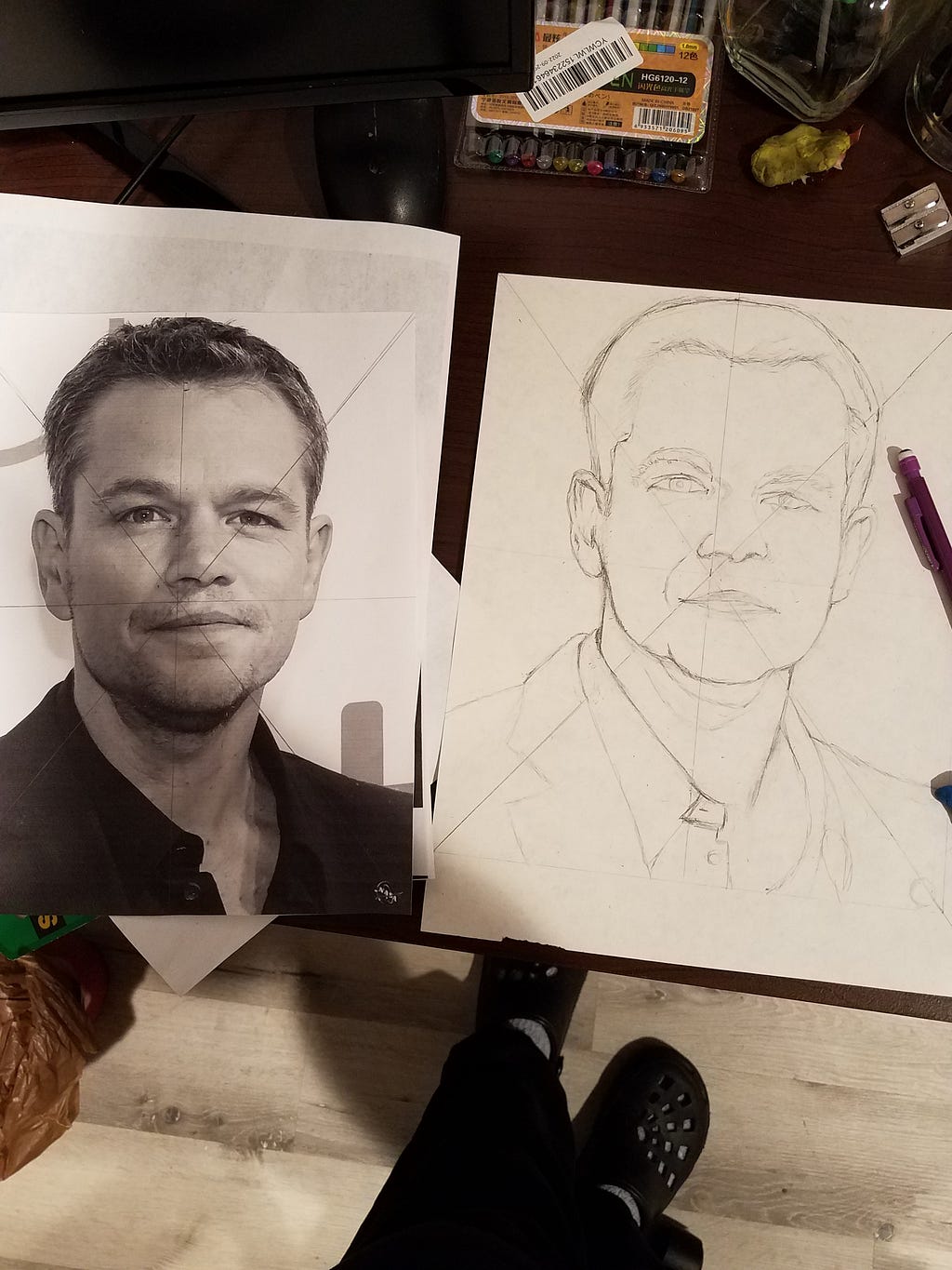 A pencil drawing in process of the actor Matt Damon