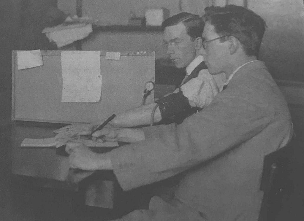 William Moulton Marston administering early lie detector test in 1914 at Harvard