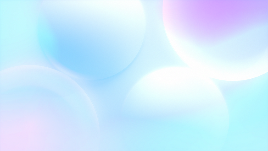 Overlapping bubbles in light hues of blue and pink clashing against one another