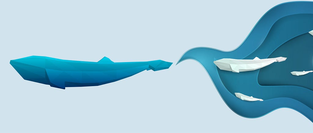 Paper origami/cut-outs showing a blue whale emerging out of a wave that contains a number of smaller white whales.