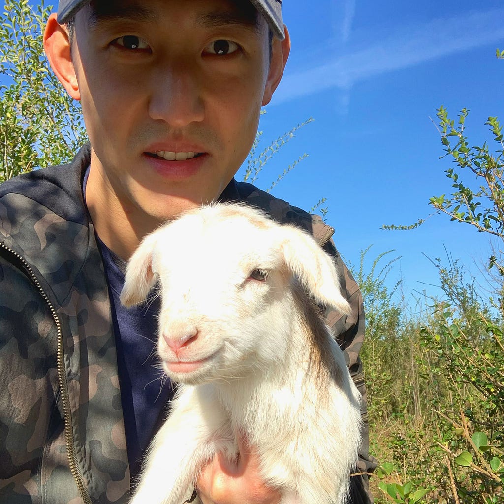 The photo of me holding a lamb that spurred a thoughtful question on Instagram.