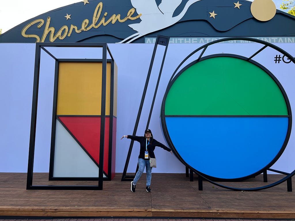 A picture of me posing in front of the gigantic Google IO sign