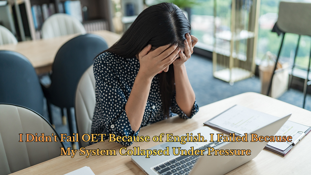 Female healthcare professional at desk with laptop holding head in hands showing stress and frustration during OET exam preparation, demonstrating system collapse under timed pressure despite strong English skills