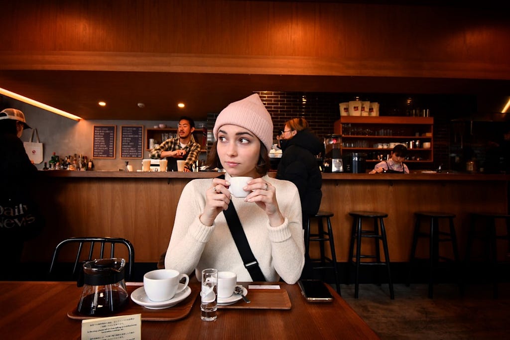 Max Harlynking took this photo of a woman drinking coffee at a cafe in Tokyo, Japan.