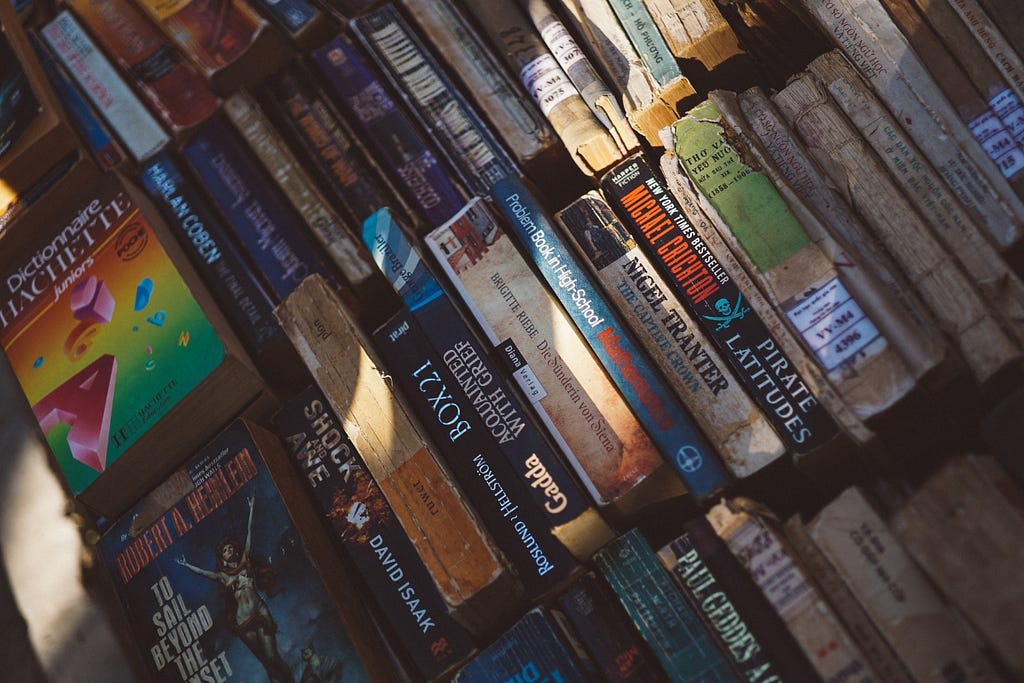 Books spines lined up in the light