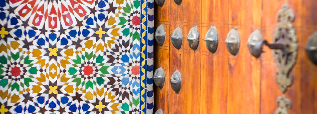 Colorful mosaic at a door in Marrakech.