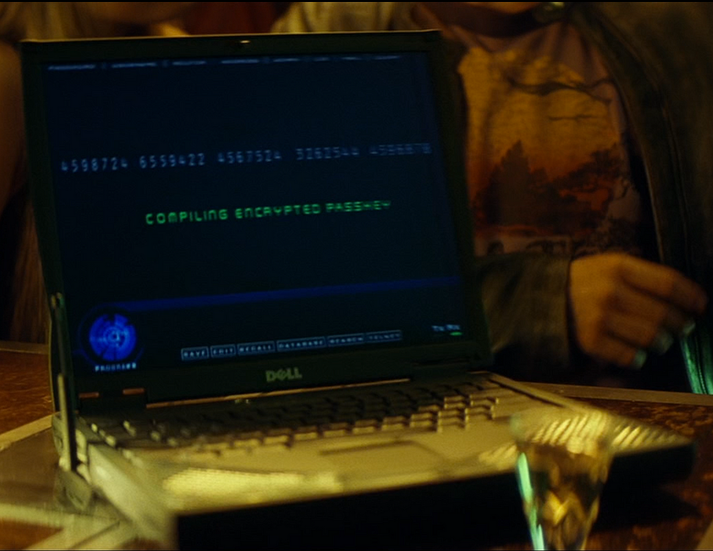 A screenshot of the laptop and screen showing the hack being performed
