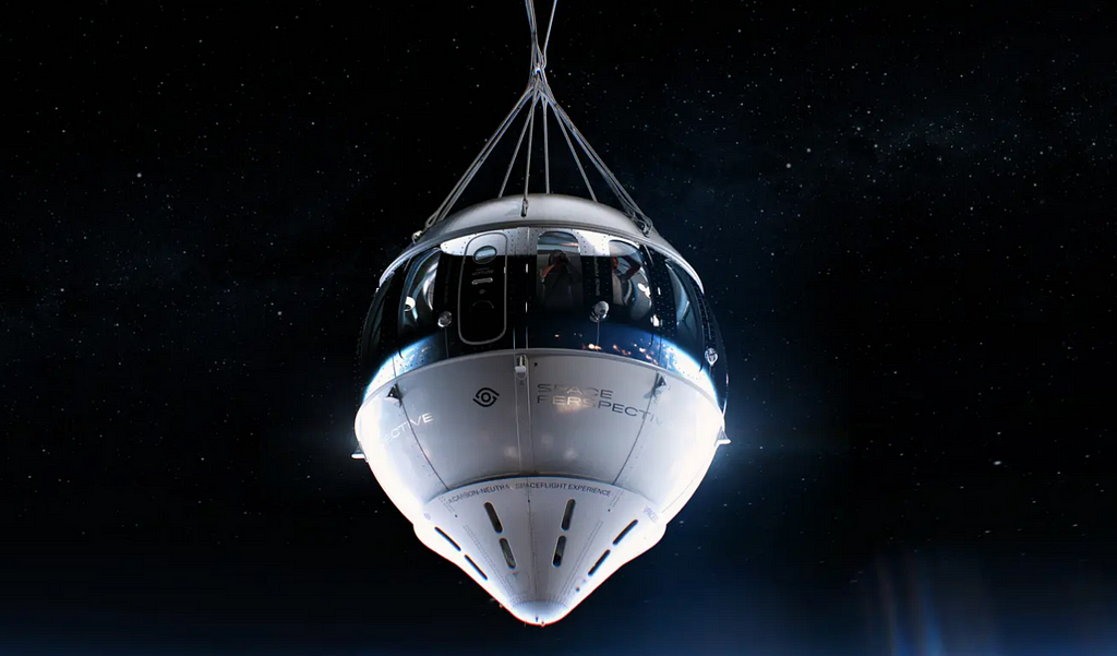 A space capsule dangling from a balloon (not shown)