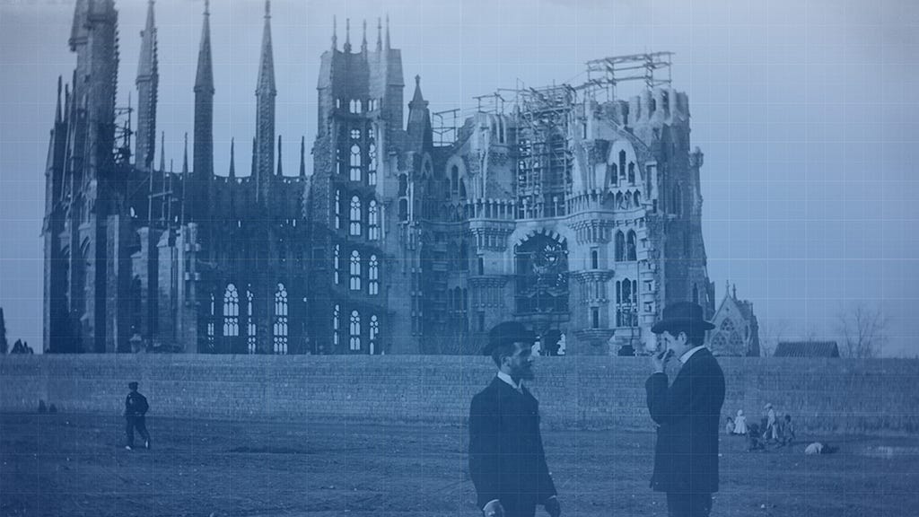 A old photo with the beginnings of the Sagrada Família’s construction in the background.