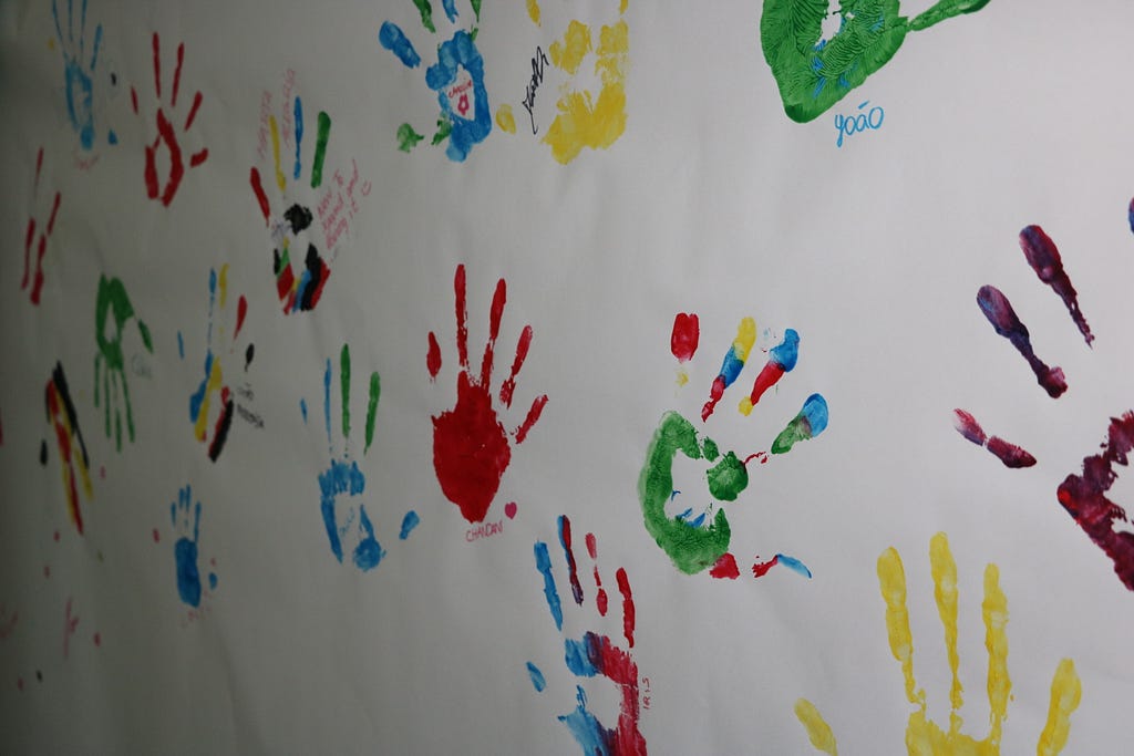 Children’s Day with colorful painting hands