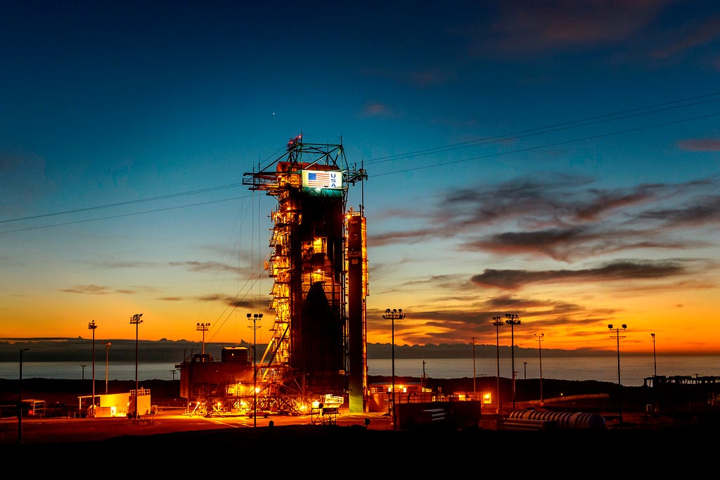 The sun sets behind Space Launch Complex 2 at Vandenberg Air Force Base, California, January 27, 2015. Photo by Bill Ingalls/NASA