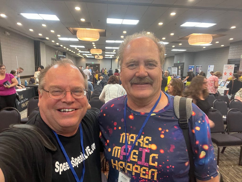 AI developer and educator Greg Jameson with Marty Dickinson at Achieve Biz Explosion Conference