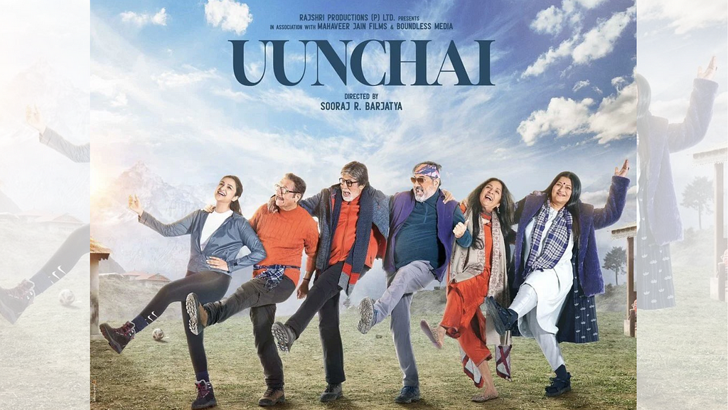 A poster shows 6 people — 3 men and 3 women — with the word Uunchai written near the top. All 6 people have stand in a straight line with one leg in the air. Their arms are interlinked and they seem to be skipping. All 6 people wear sweaters and scarfs and the Himalayas are visible in the background.