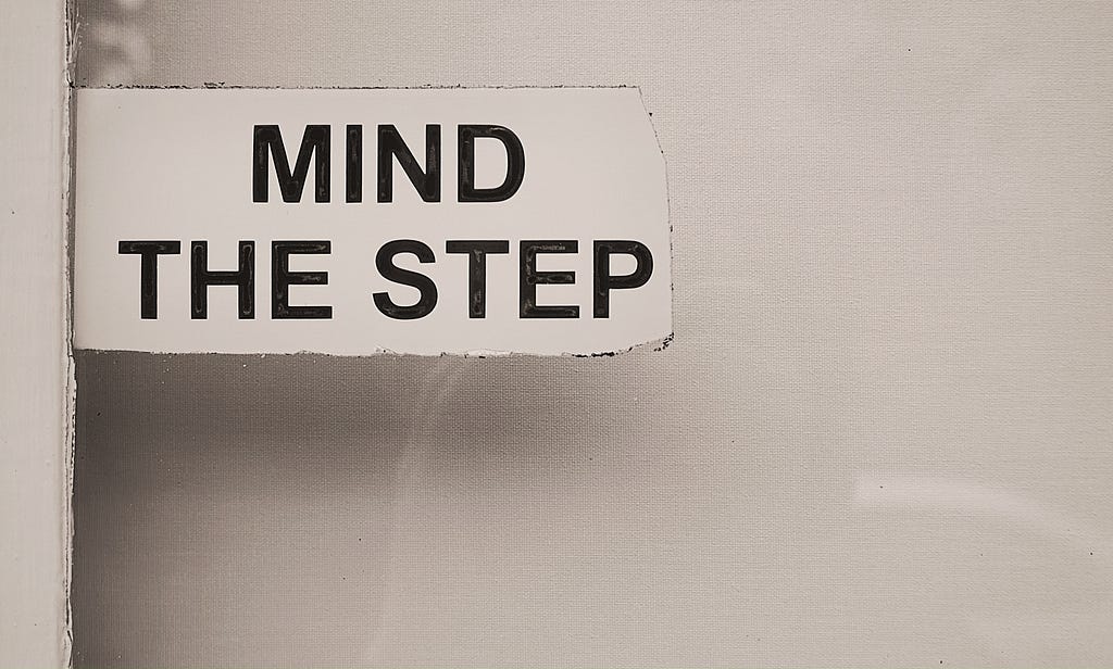 ‘Mind the step’ sign
