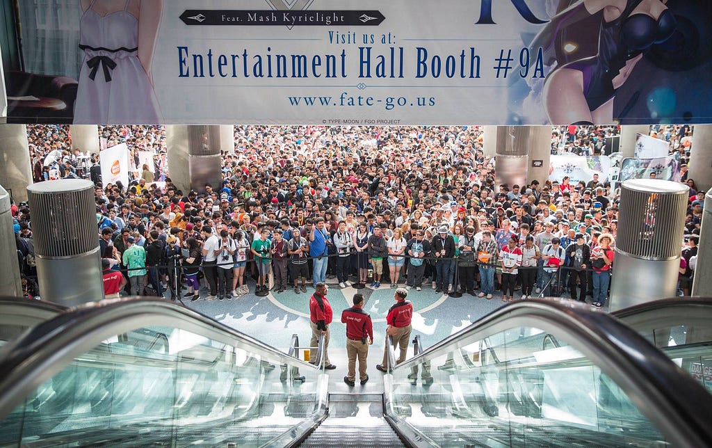 crowd people in entertainment hall booth in Anime Expo for fate grand order