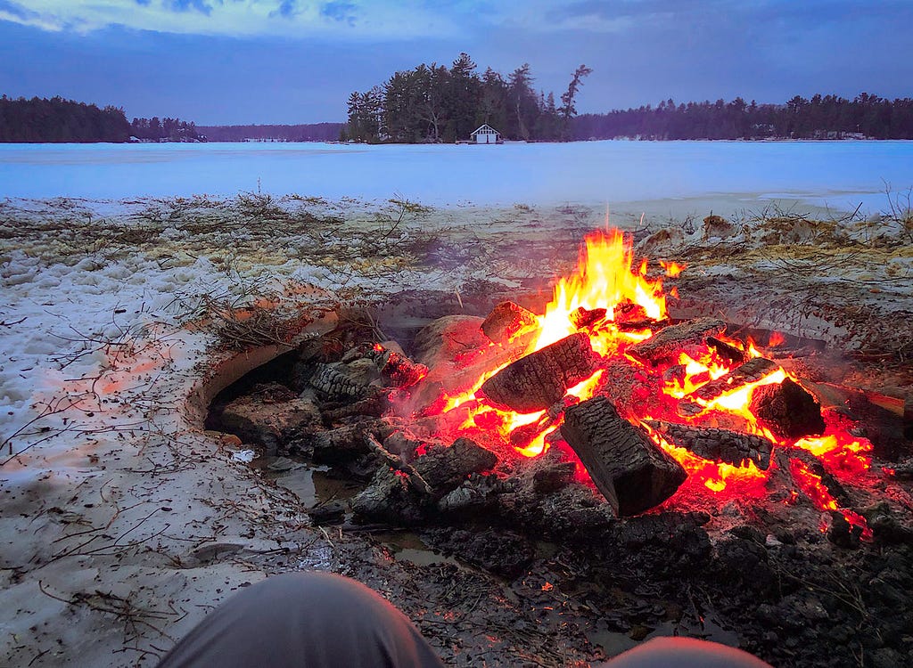 campfire on a winter shore