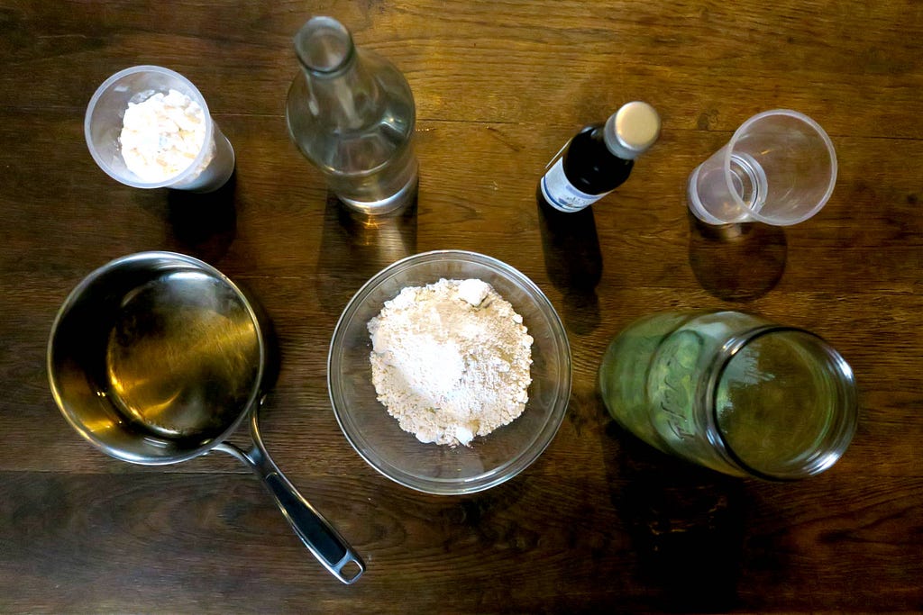 Ingredients for cooking potato paint on an old wooden table.